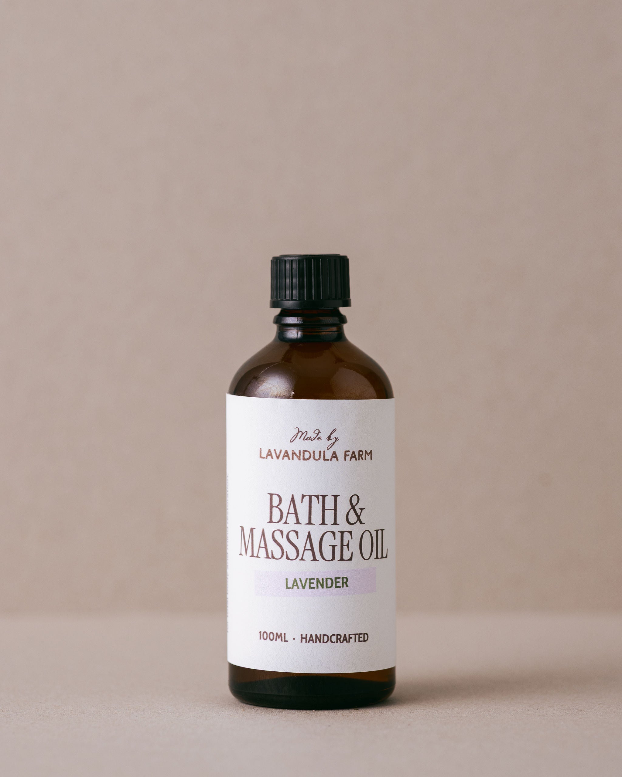 Lavender bath and massage oil in a glass bottle handmade with natural ingredients at Lavandula Farm