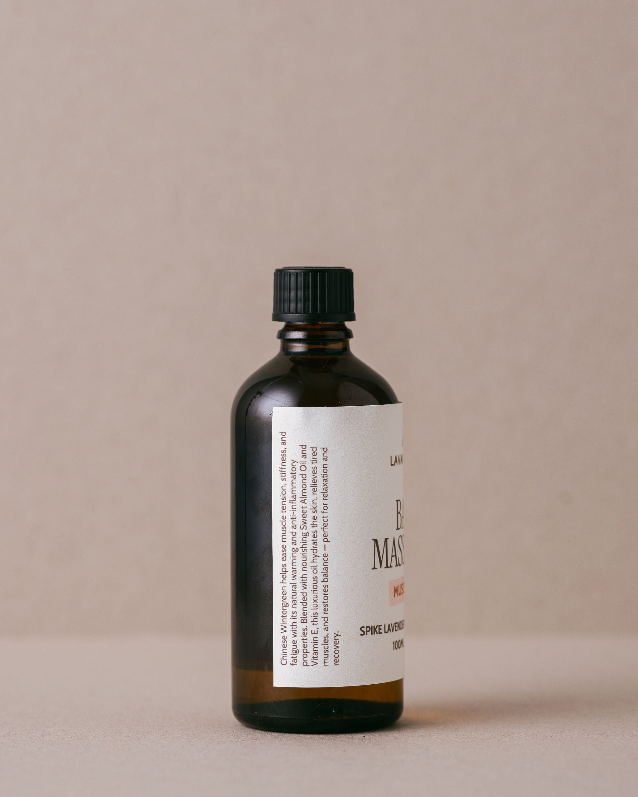 Bath and massage oil for muscle recovery in a glass bottle made using natural ingredients at Lavandula Farm