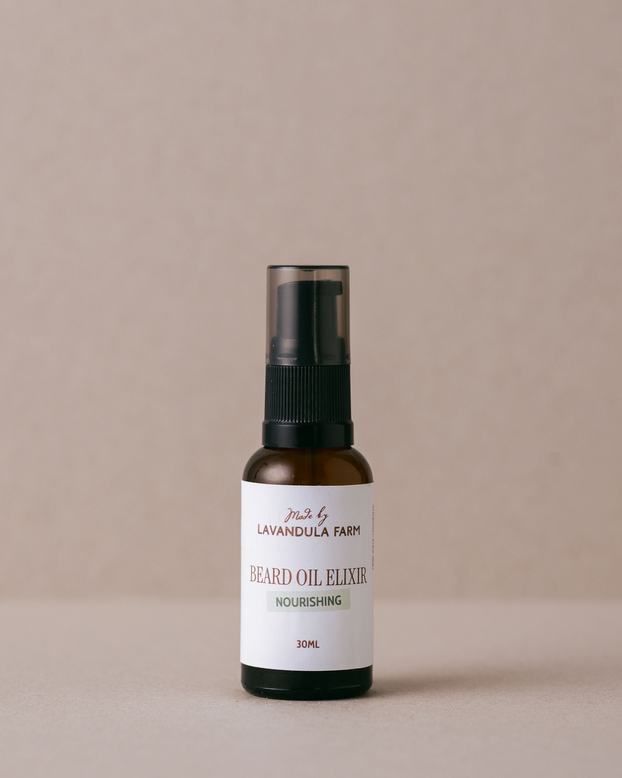 Natural nourishing beard oil for men in a glass bottle handmade at Lavandula Farm