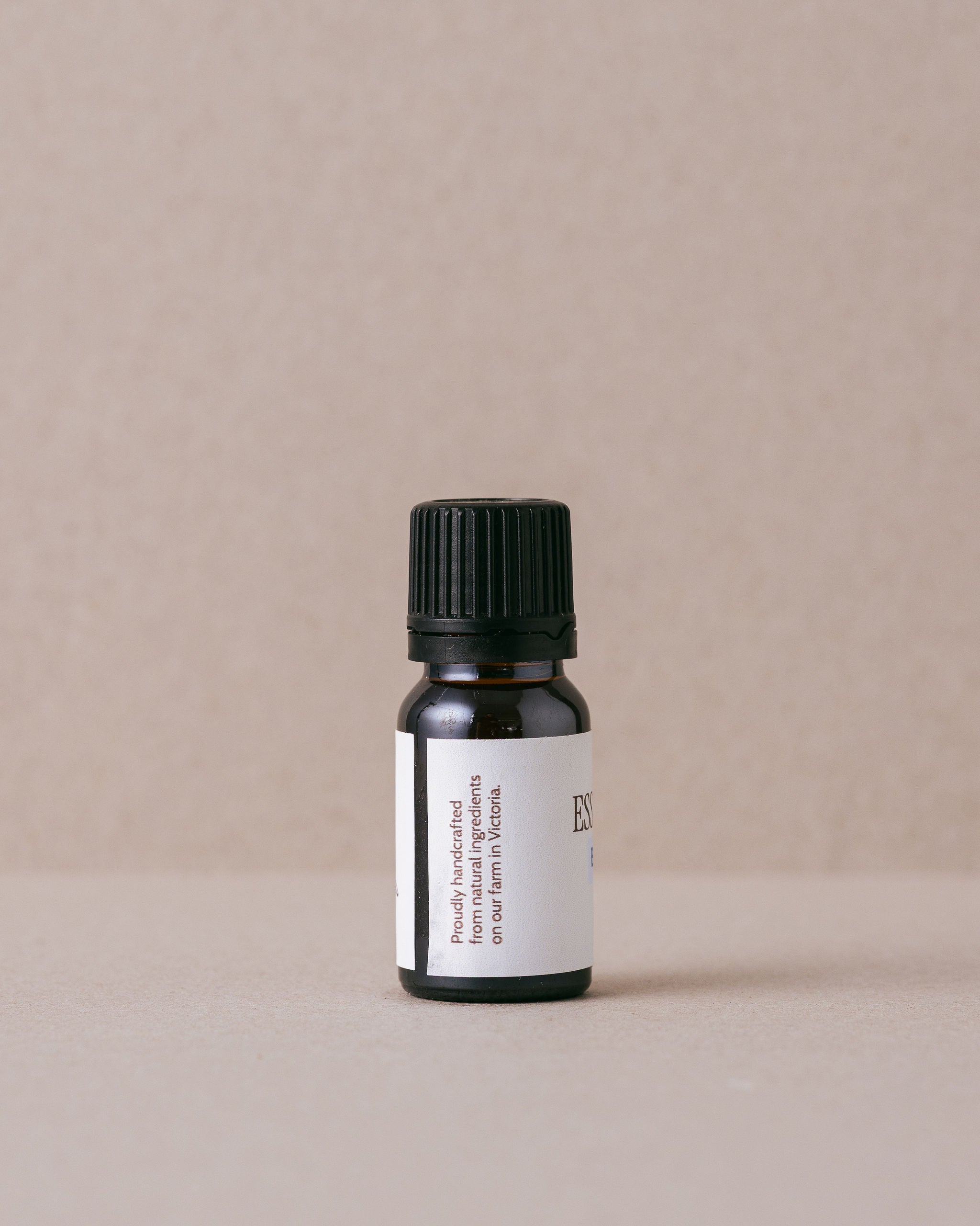 Black Pepper pure essential oil in small glass jar