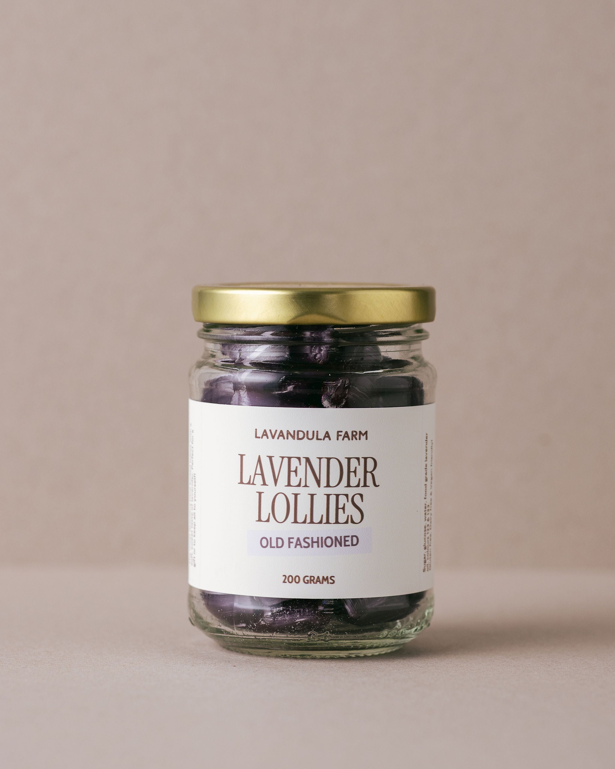 Old fashioned lavender lollies in a glass jar