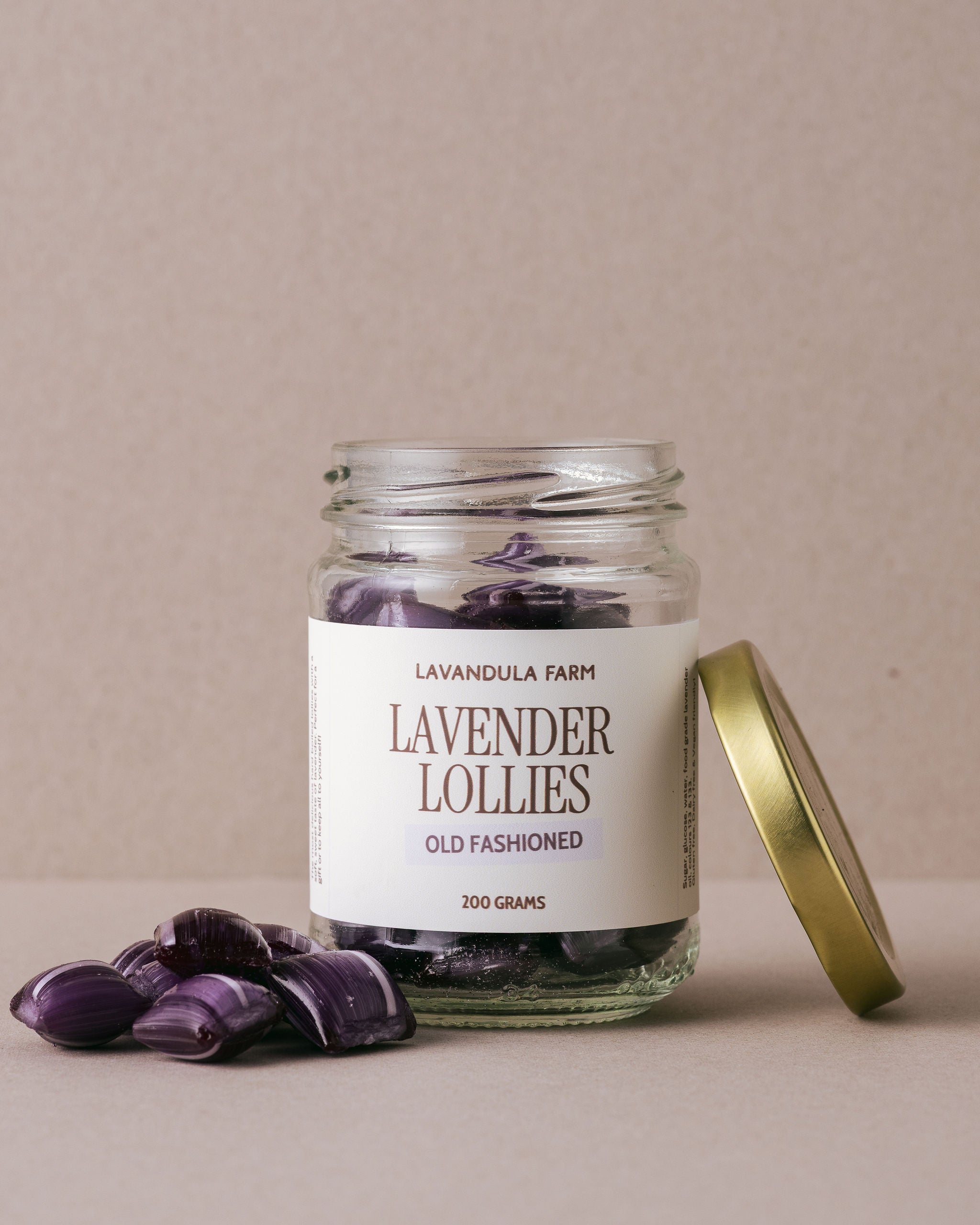 Old fashioned lavender lollies in a glass jar