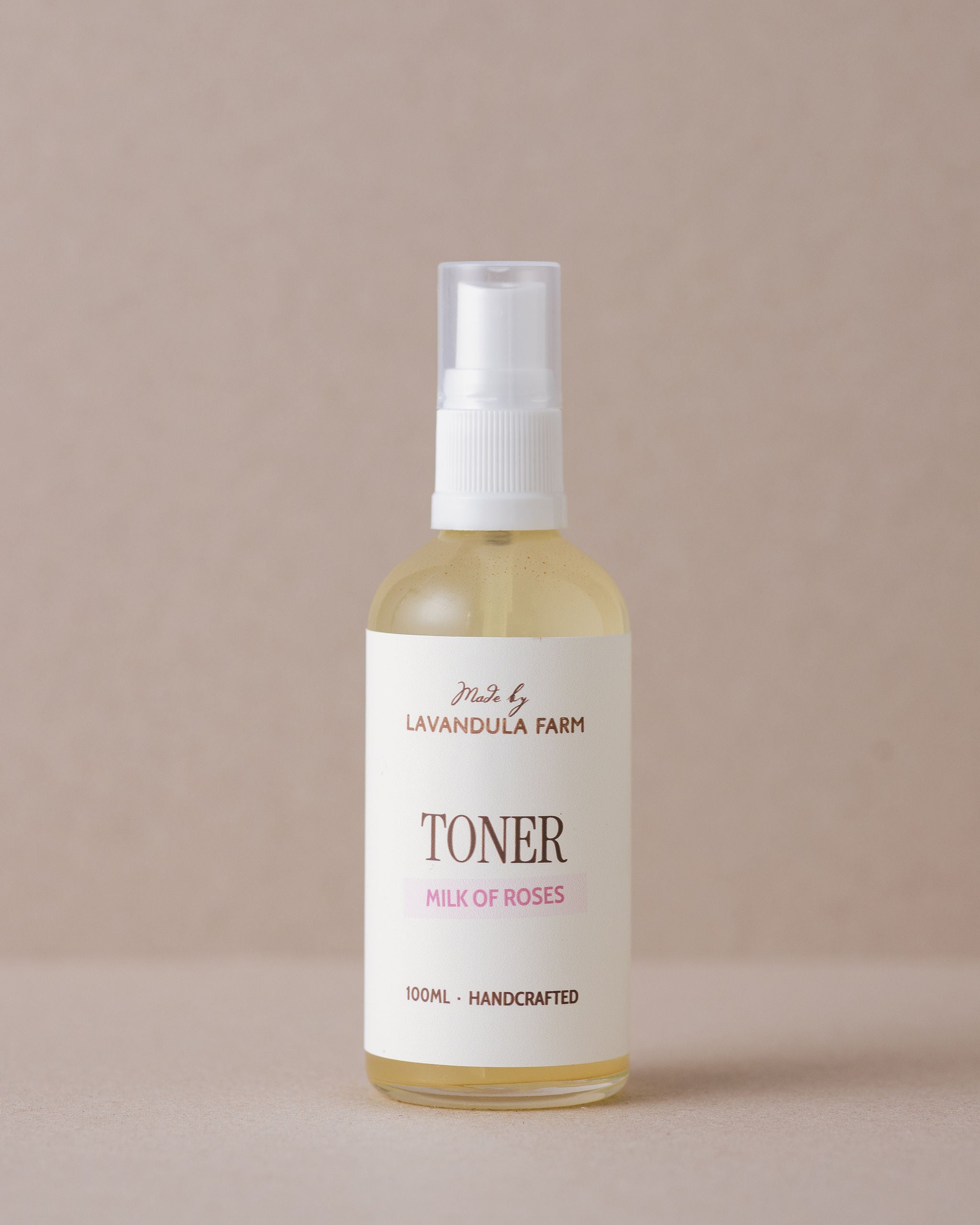 Rose water skin toner in a glass bottle made with natural ingredients at Lavandula Farm