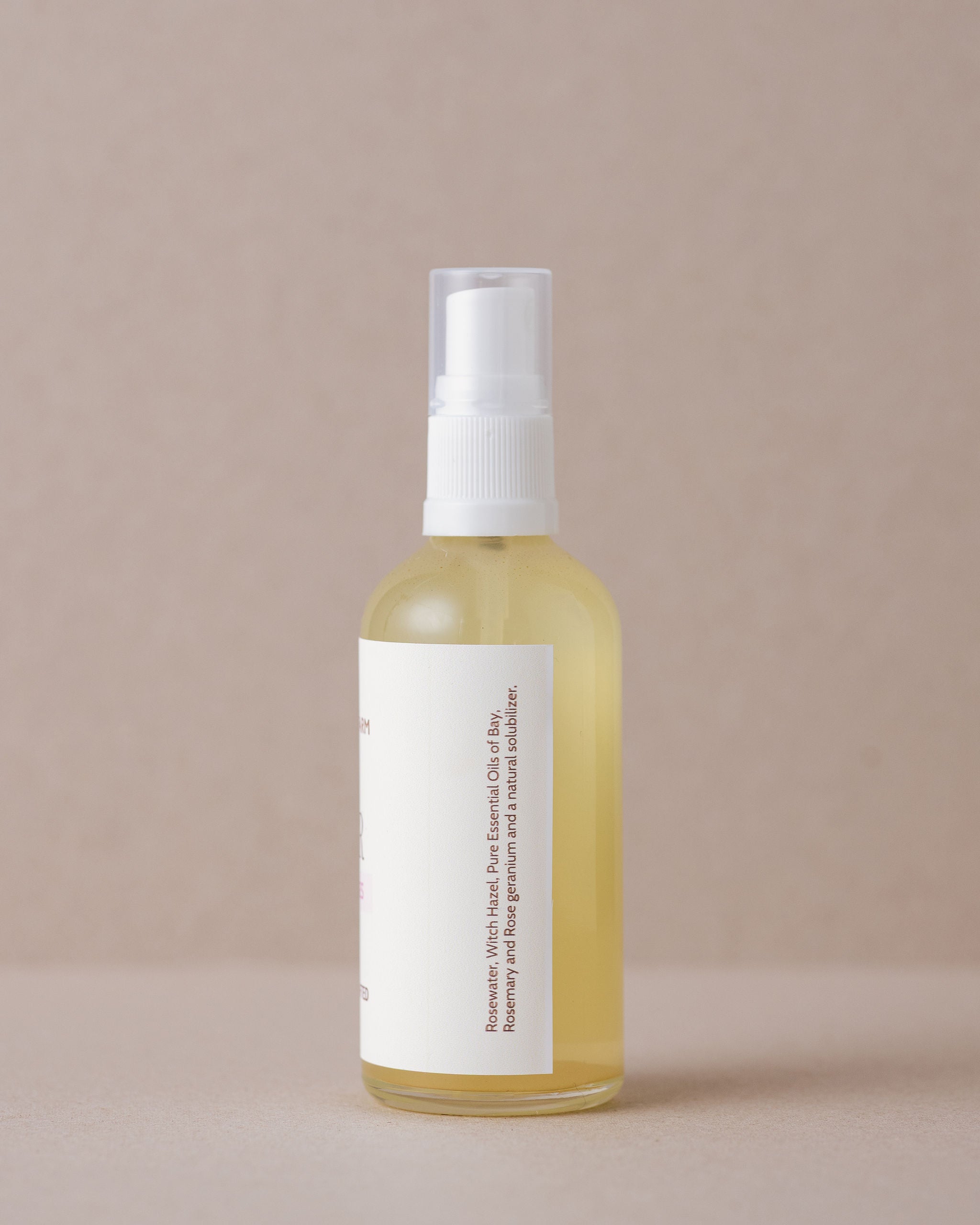Rose water skin toner in a glass bottle made with natural ingredients at Lavandula Farm