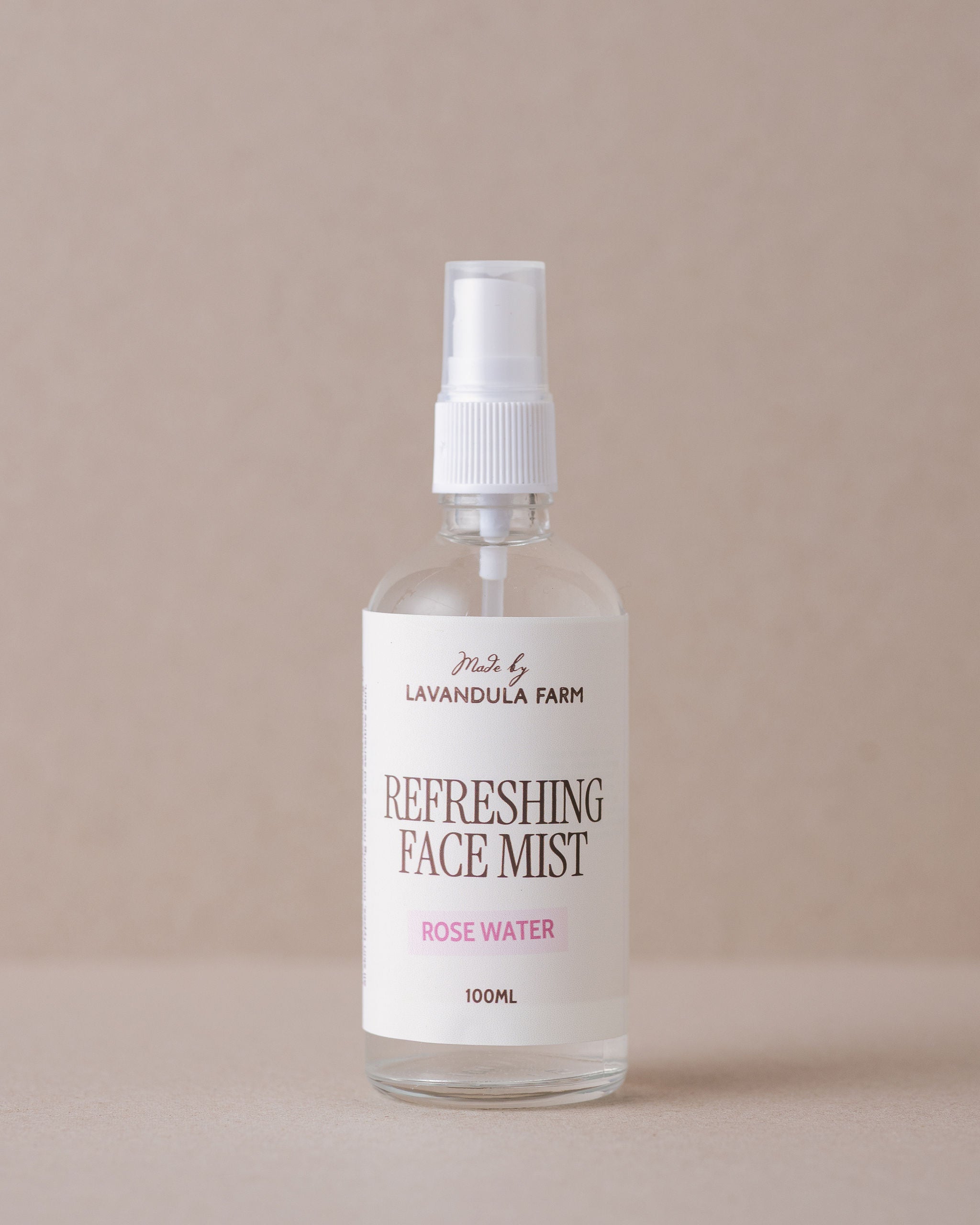 Rose water face mist in a glass bottle made with natural ingredients on Lavandula Farm