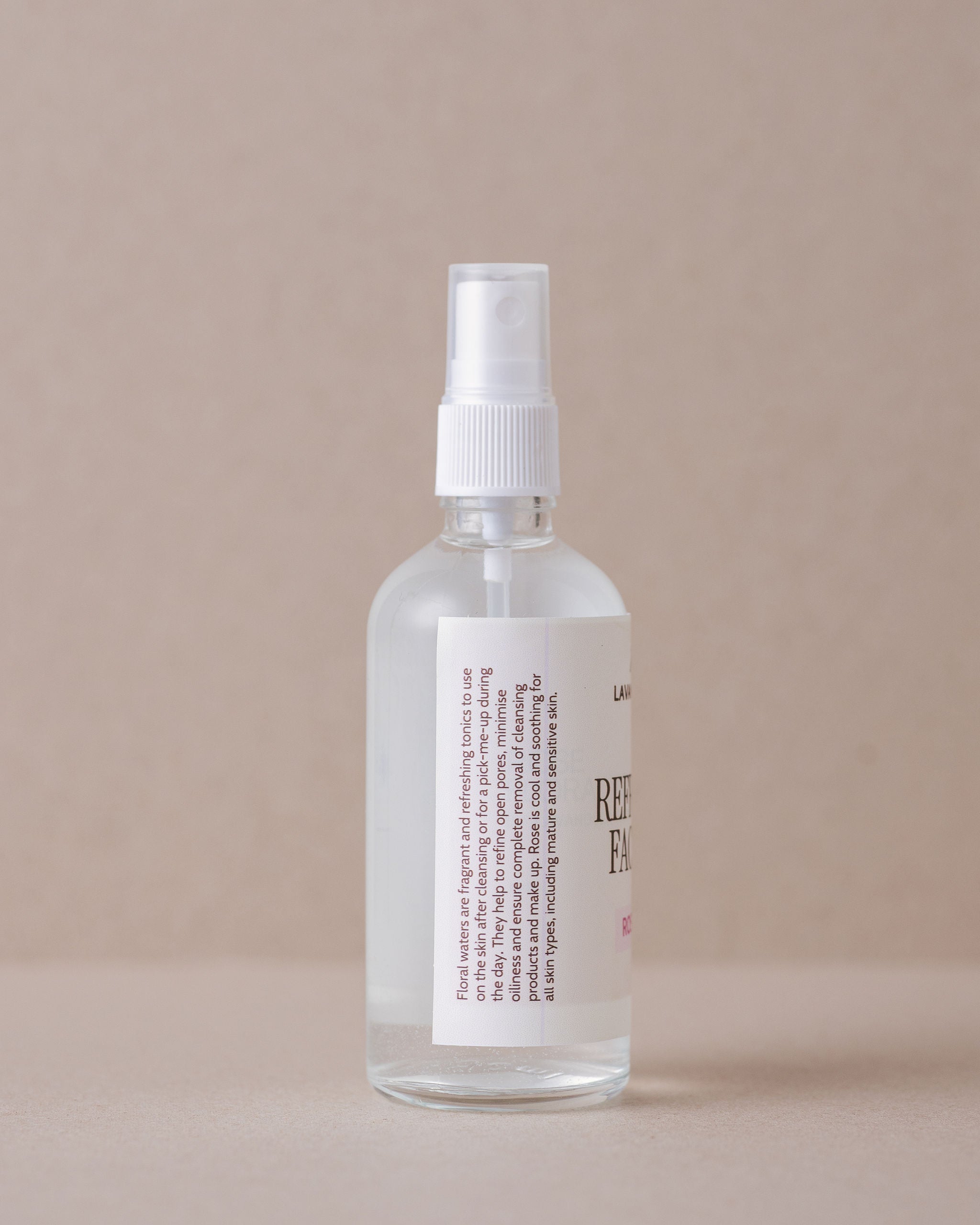 Rose water face mist in a glass bottle made with natural ingredients on Lavandula Farm