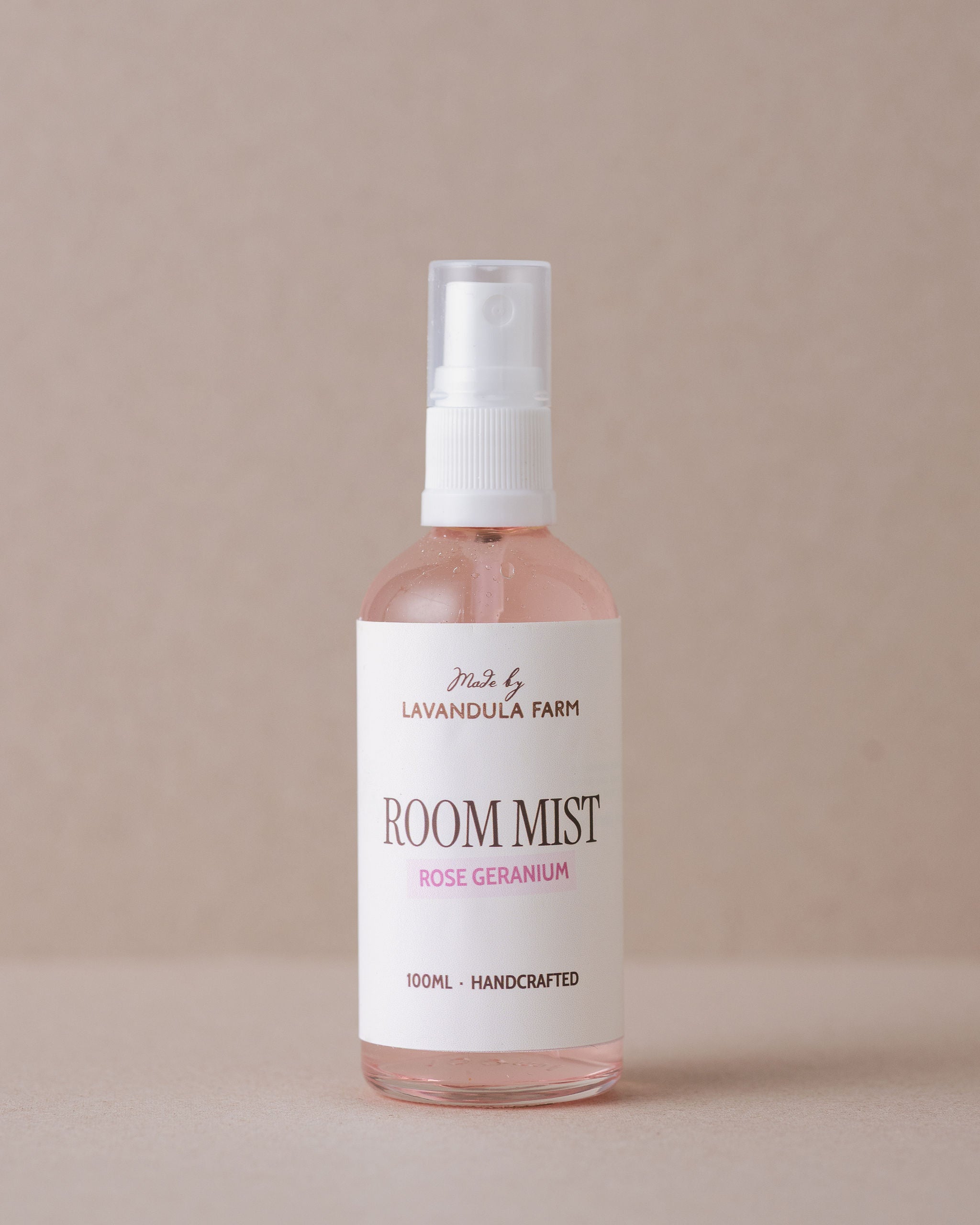 Natural rose-scented room mist in a glass bottle handmade at Lavandula Farm