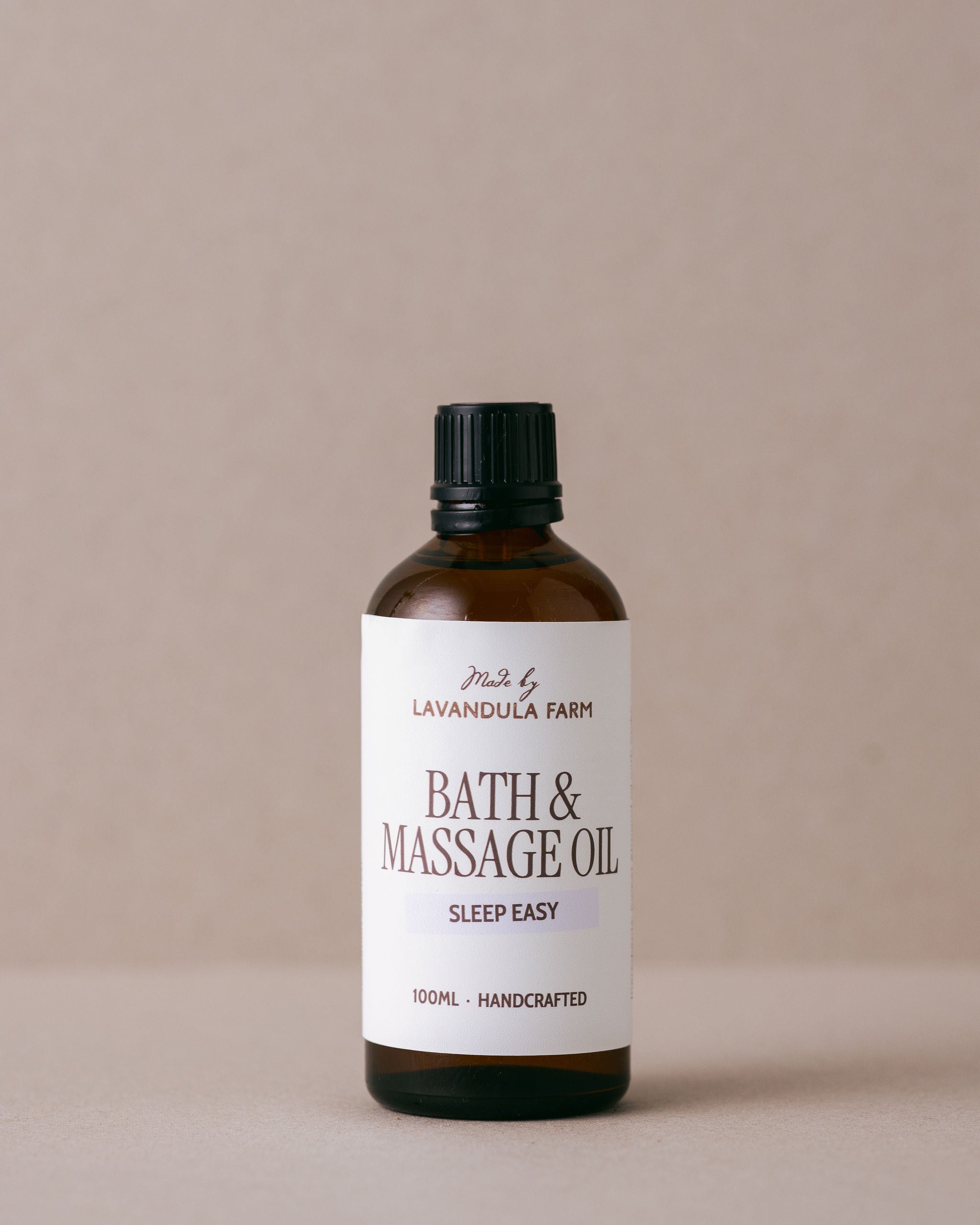Bath and massage oil made for restful sleep in a glass bottle handmade with natural ingredients at Lavandula Farm