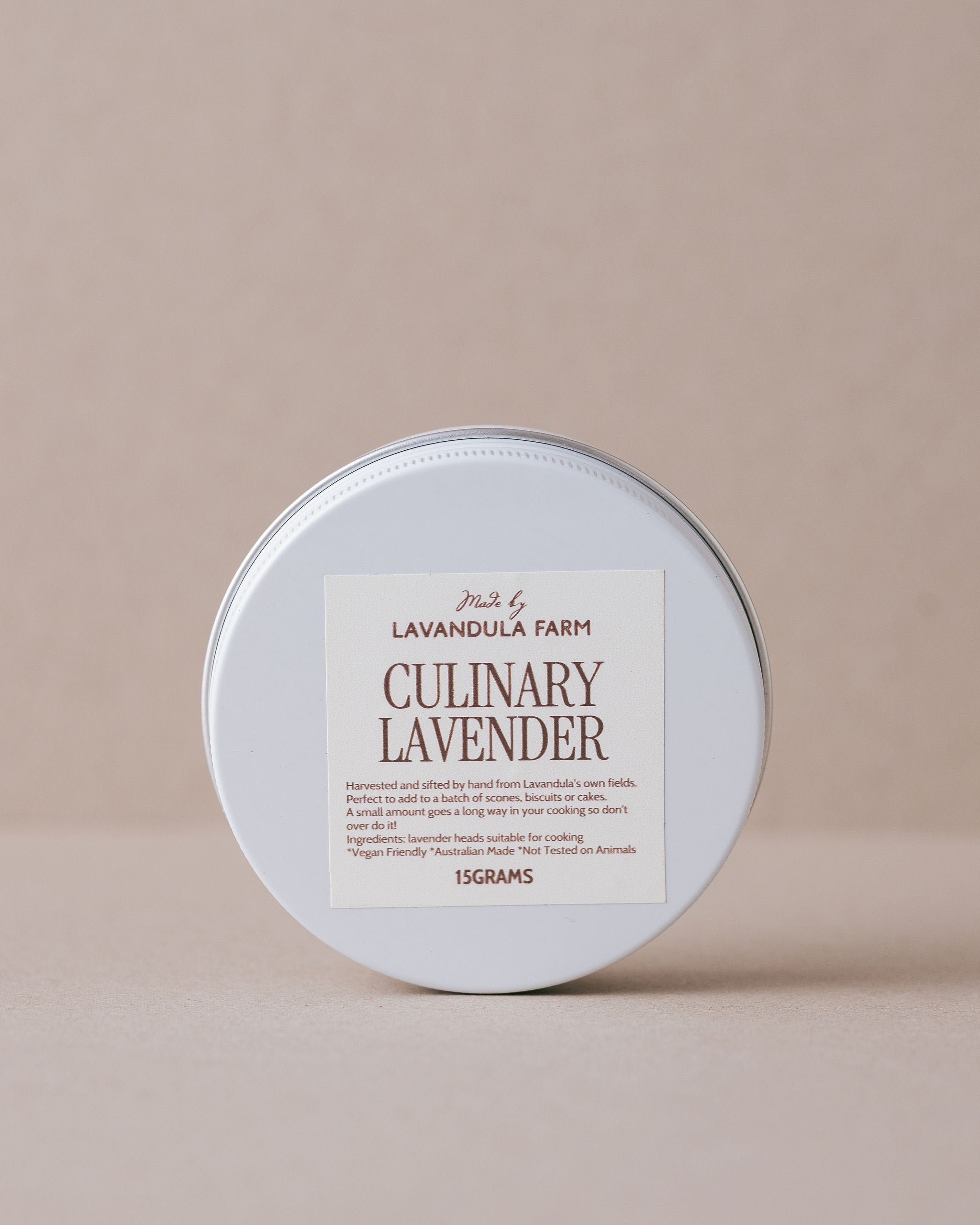 Culinary lavender container with label on a beige background