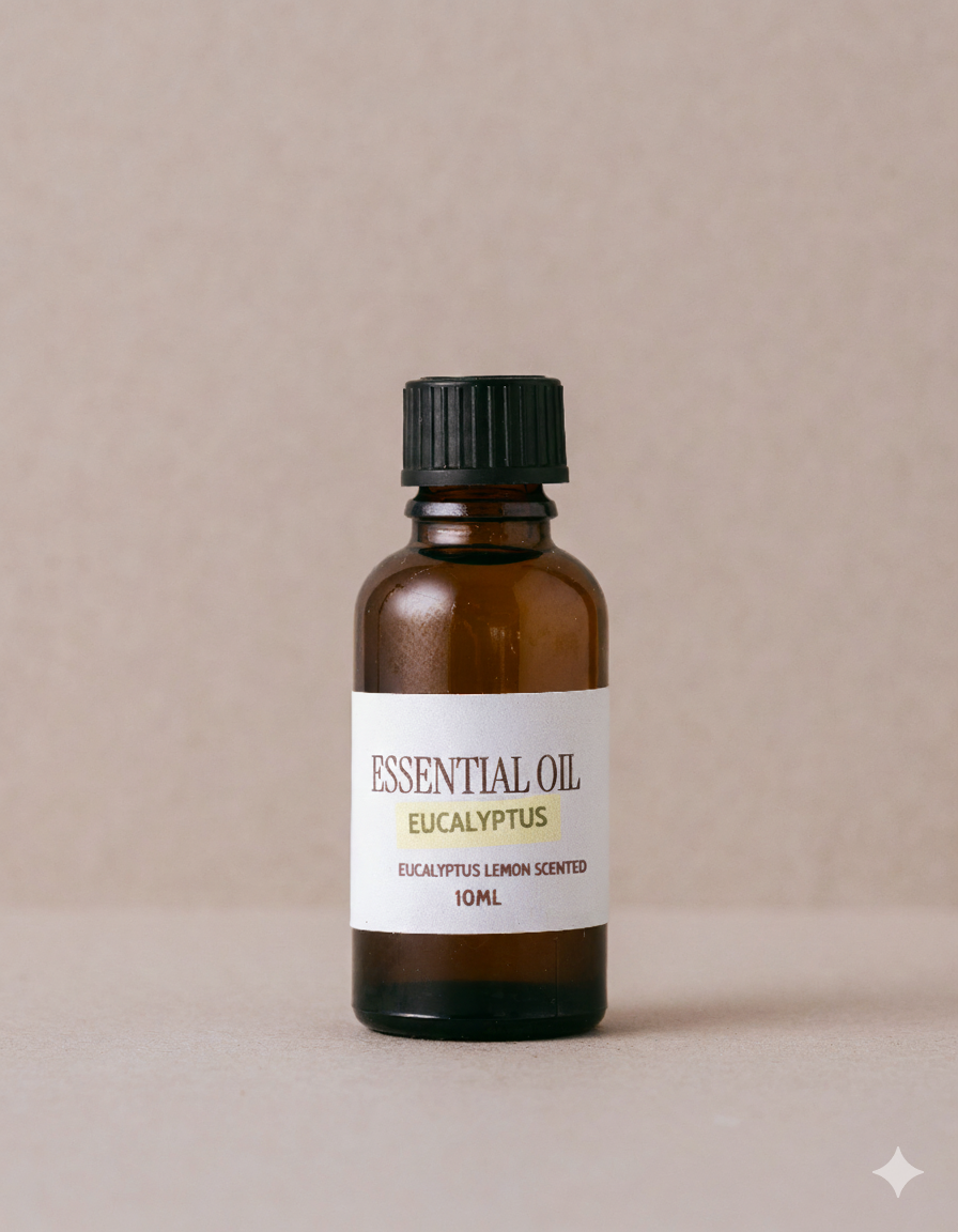 glass bottle of eucalyptus lemon scented essential oil on a beige background