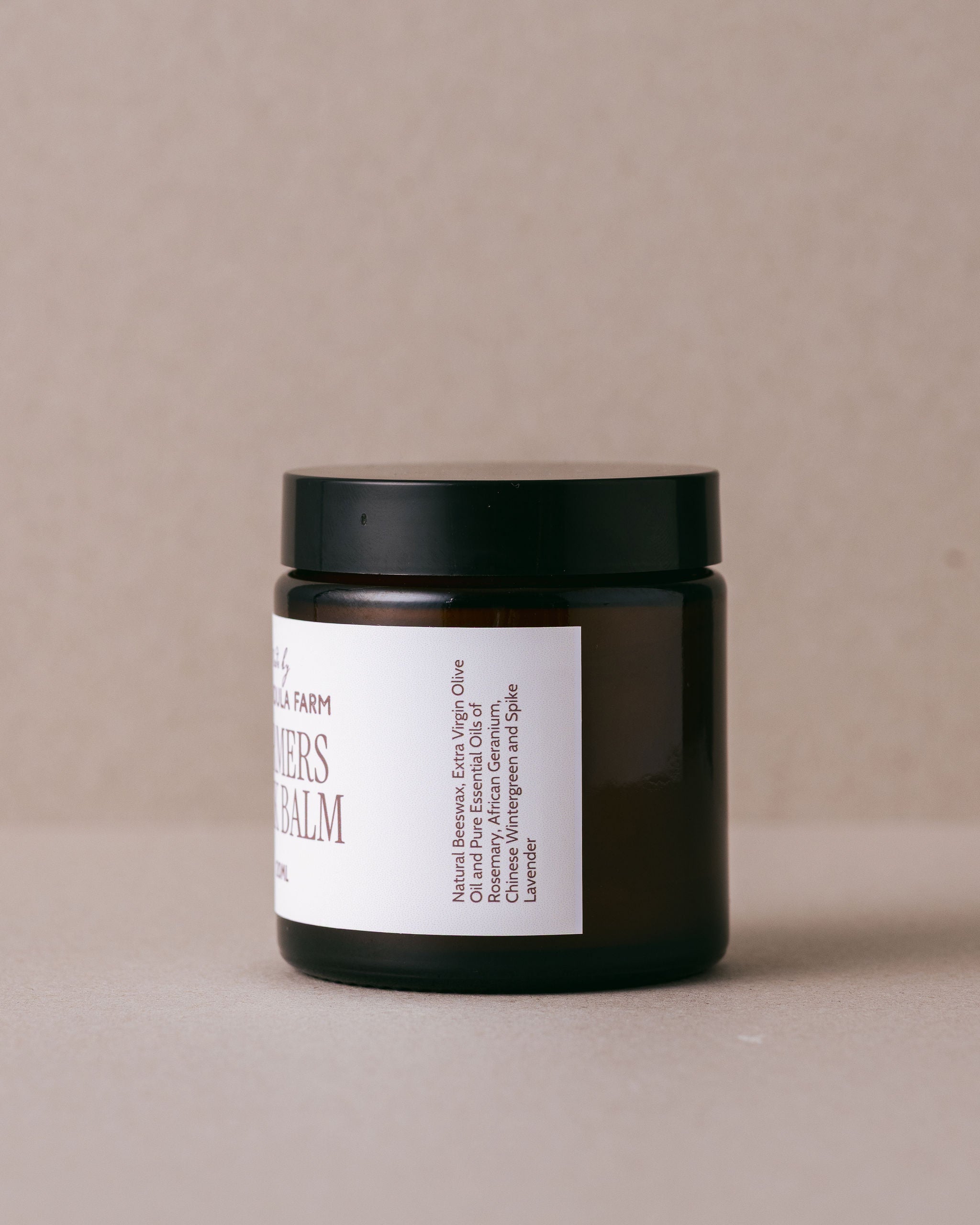glass jar of farmer's back balm made with natural ngredients at Lavandula Farm