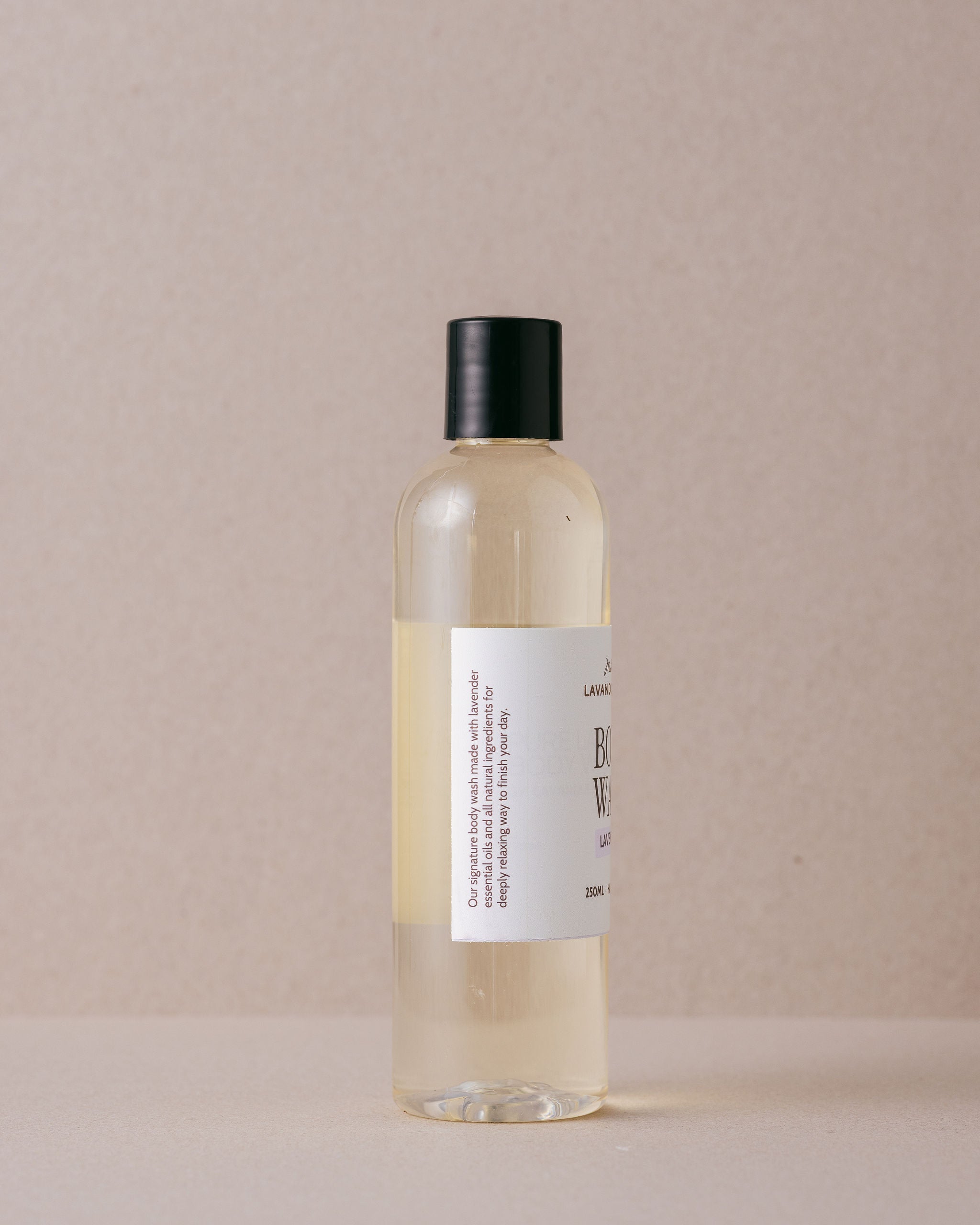 lavender body wash in a tall plastic bottle made with natural ingredients at Lavandula Farm