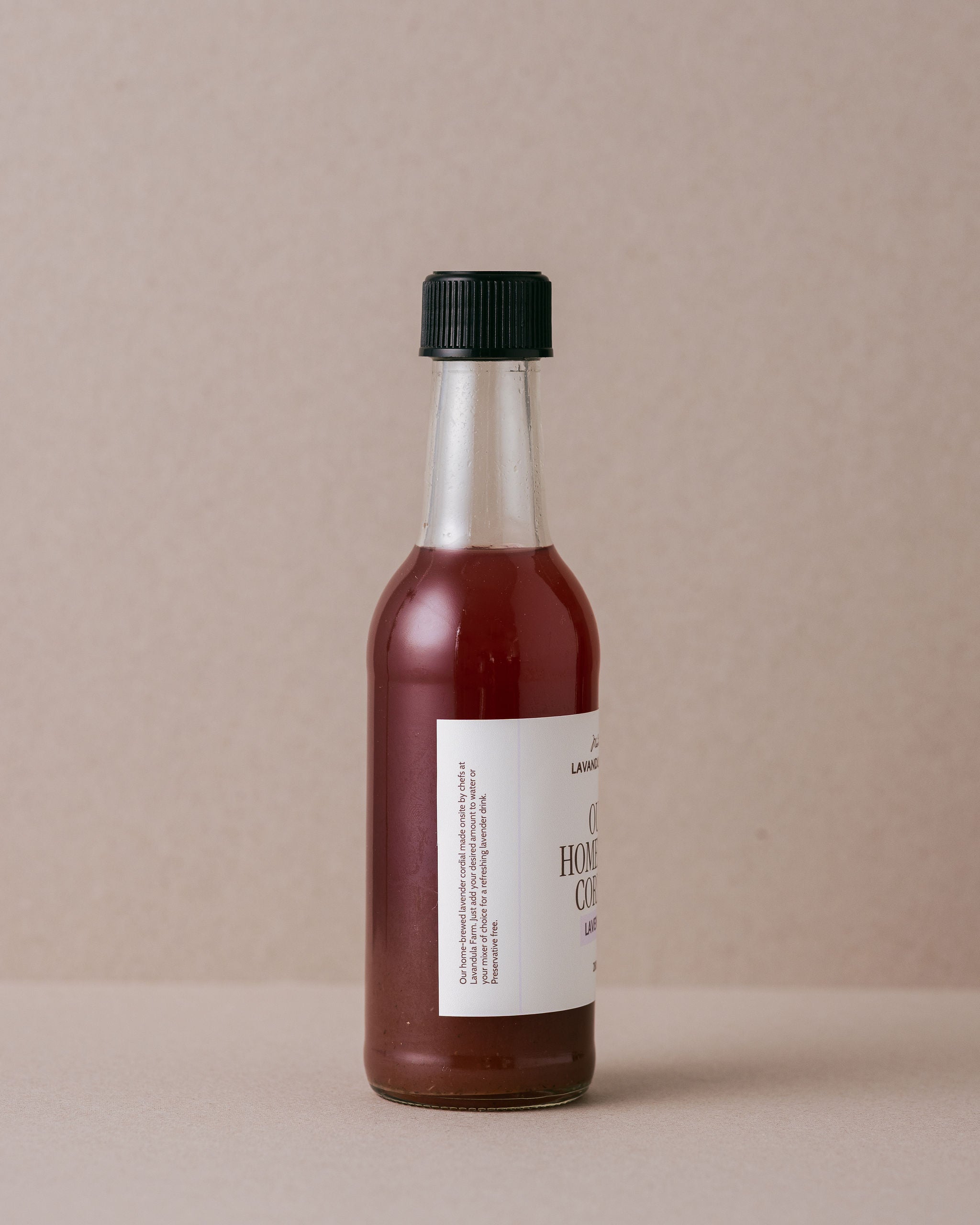 Lavender cordial in a glass bottle handmade at Lavandula Farm