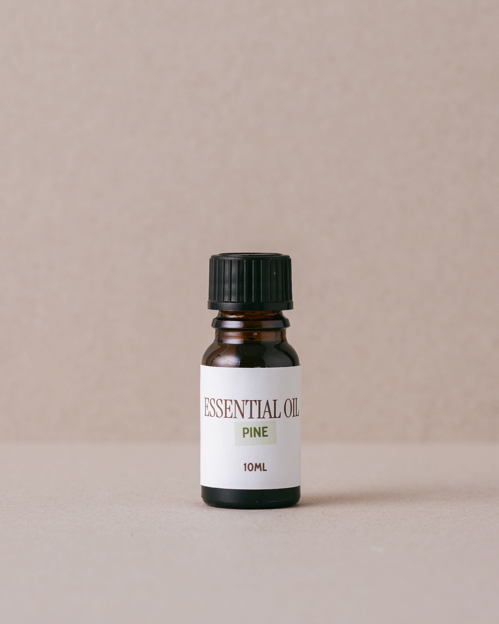 pine essential oil in a small glass bottle
