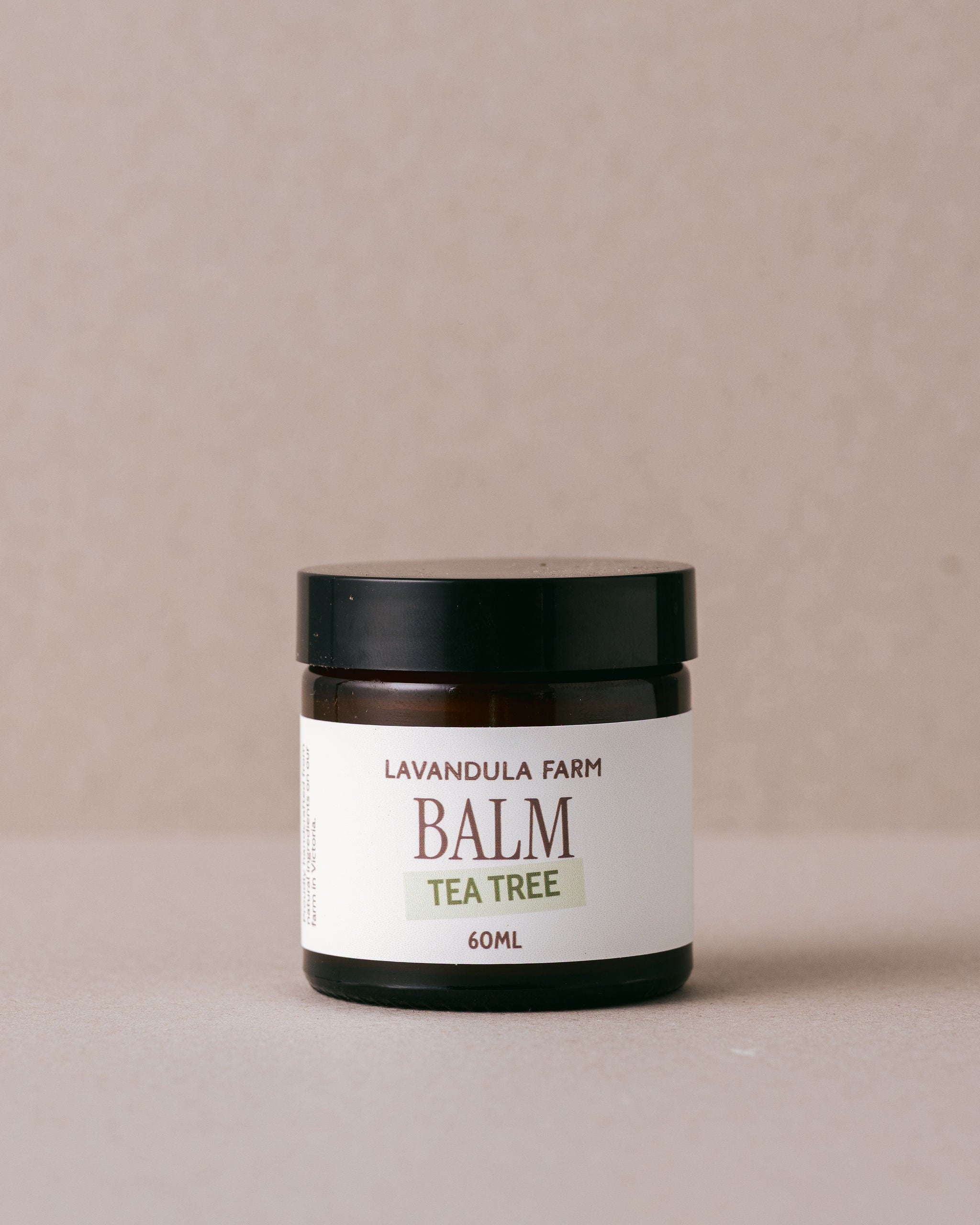 tea tree balm in a small glass jar made with natural ingredients at Lavandula Farm