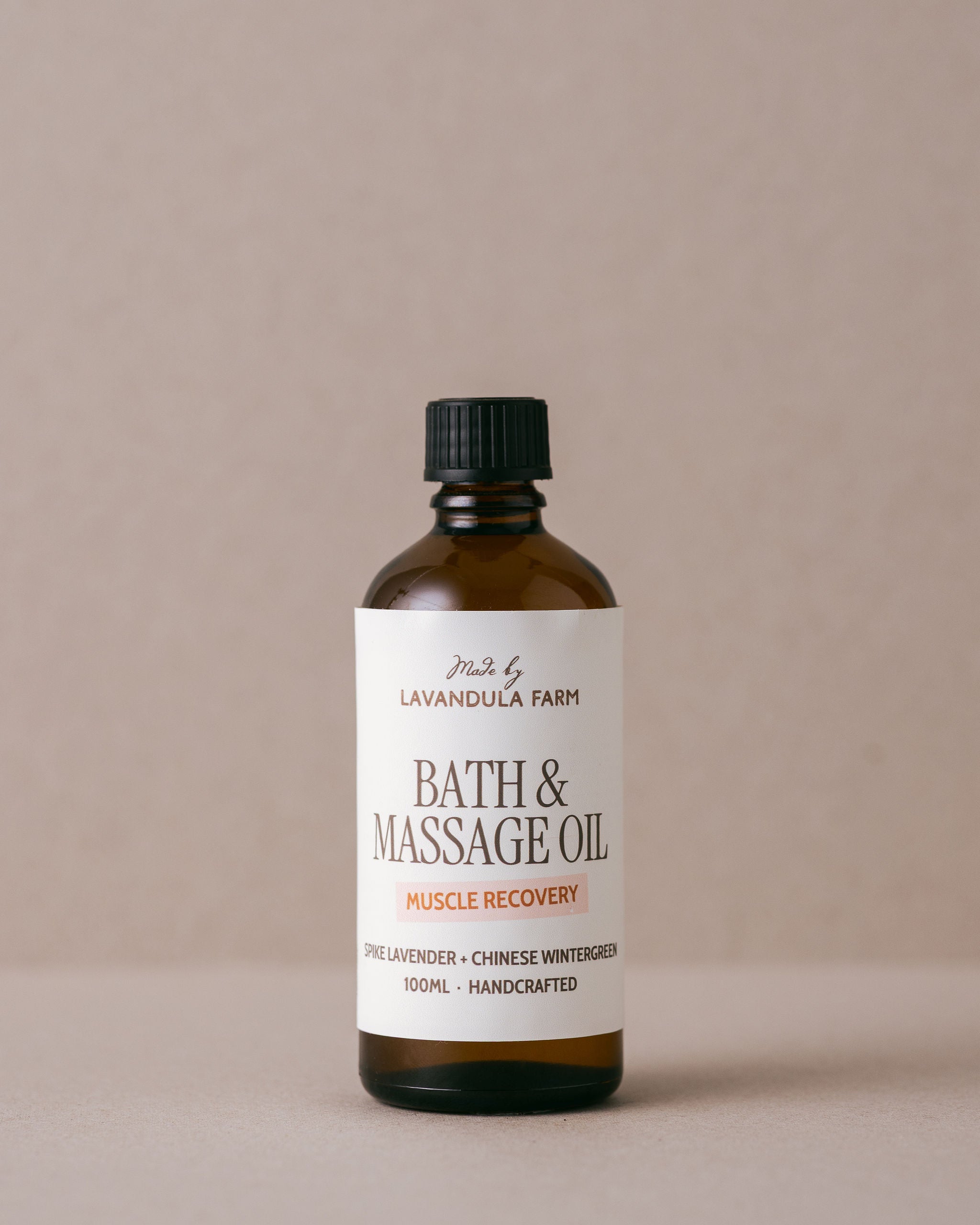 Bath and massage oil for muscle recovery in a glass bottle made using natural ingredients at Lavandula Farm