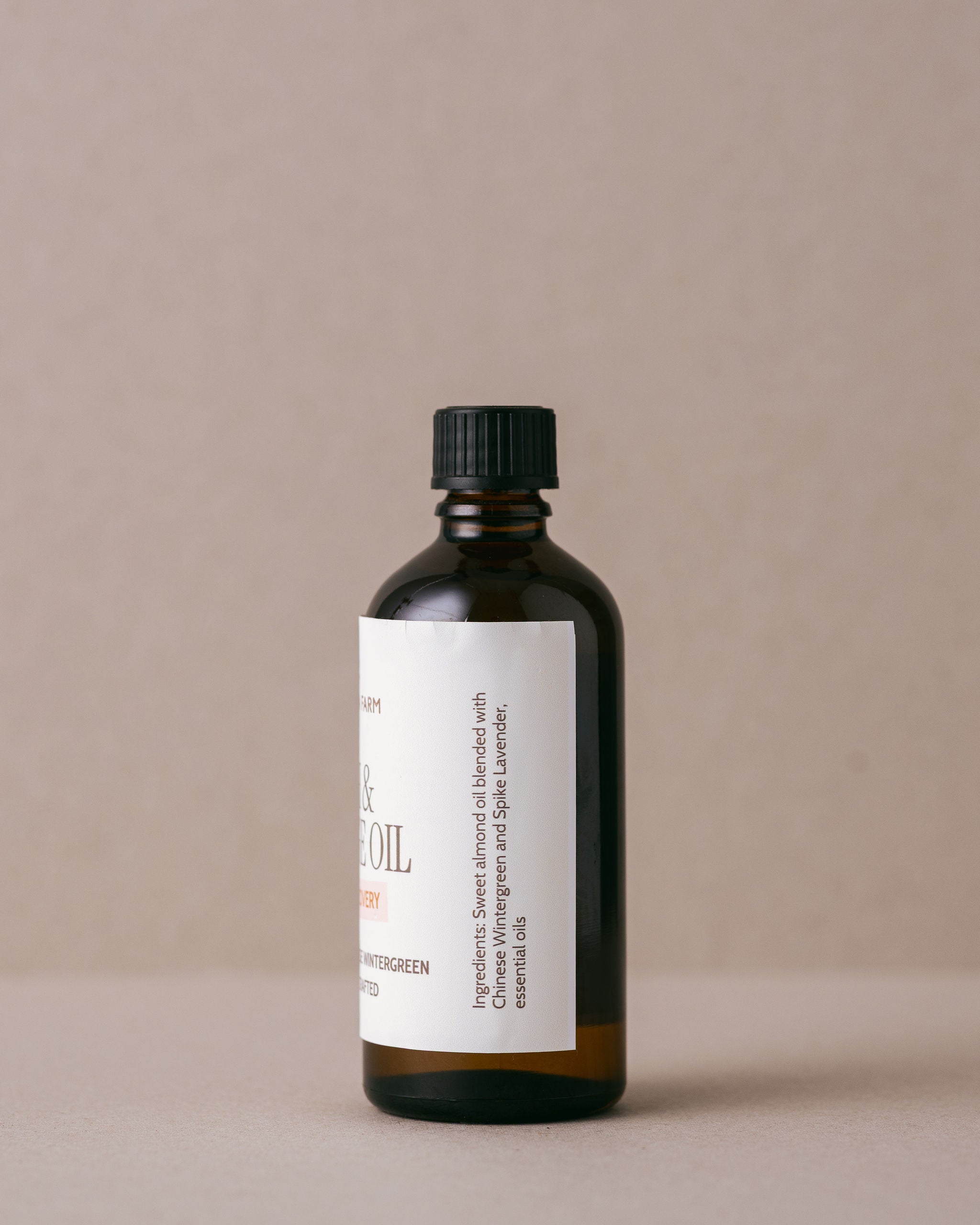 Bath and massage oil for muscle recovery in a glass bottle made using natural ingredients at Lavandula Farm