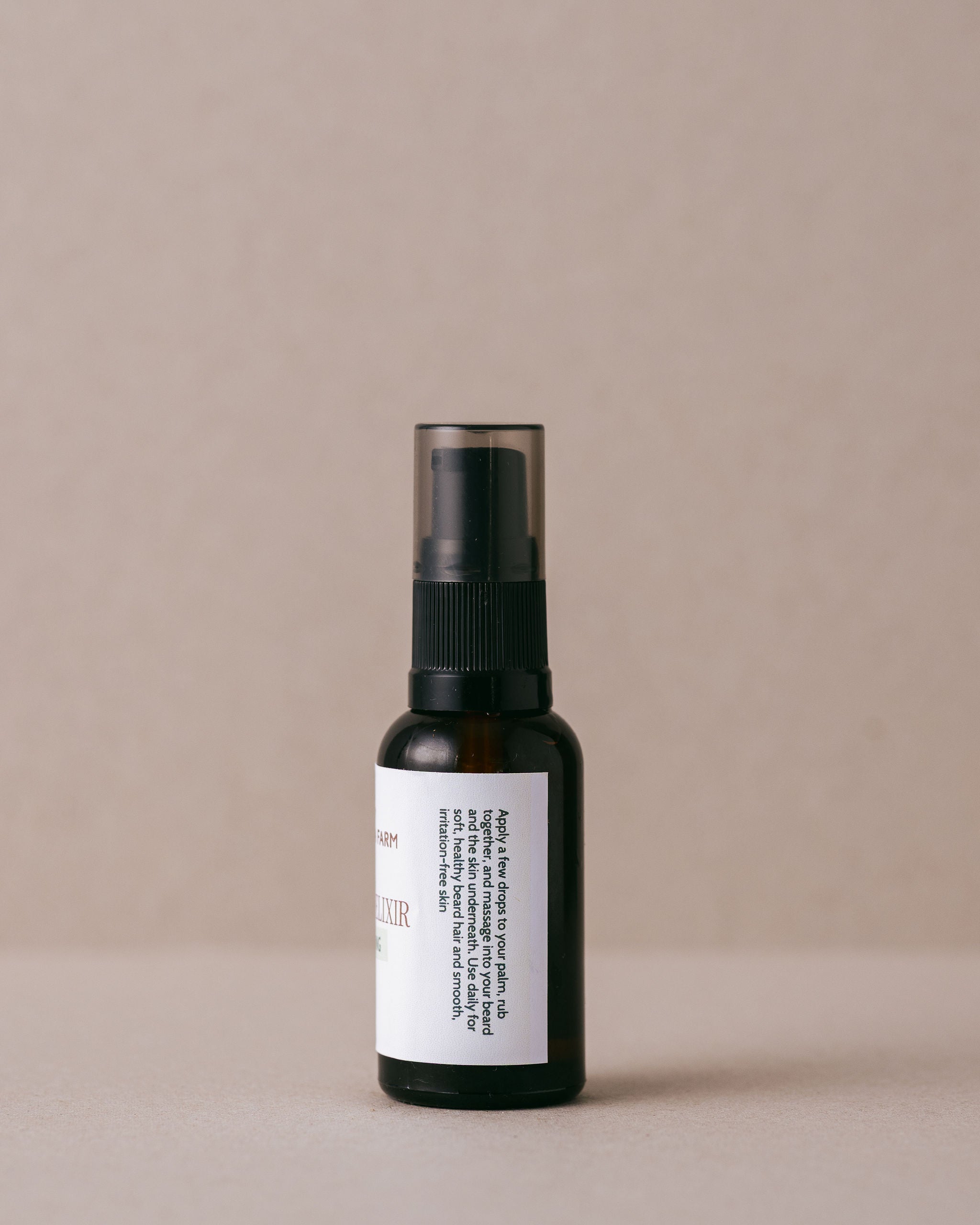 Natural nourishing beard oil for men in a glass bottle handmade at Lavandula Farm