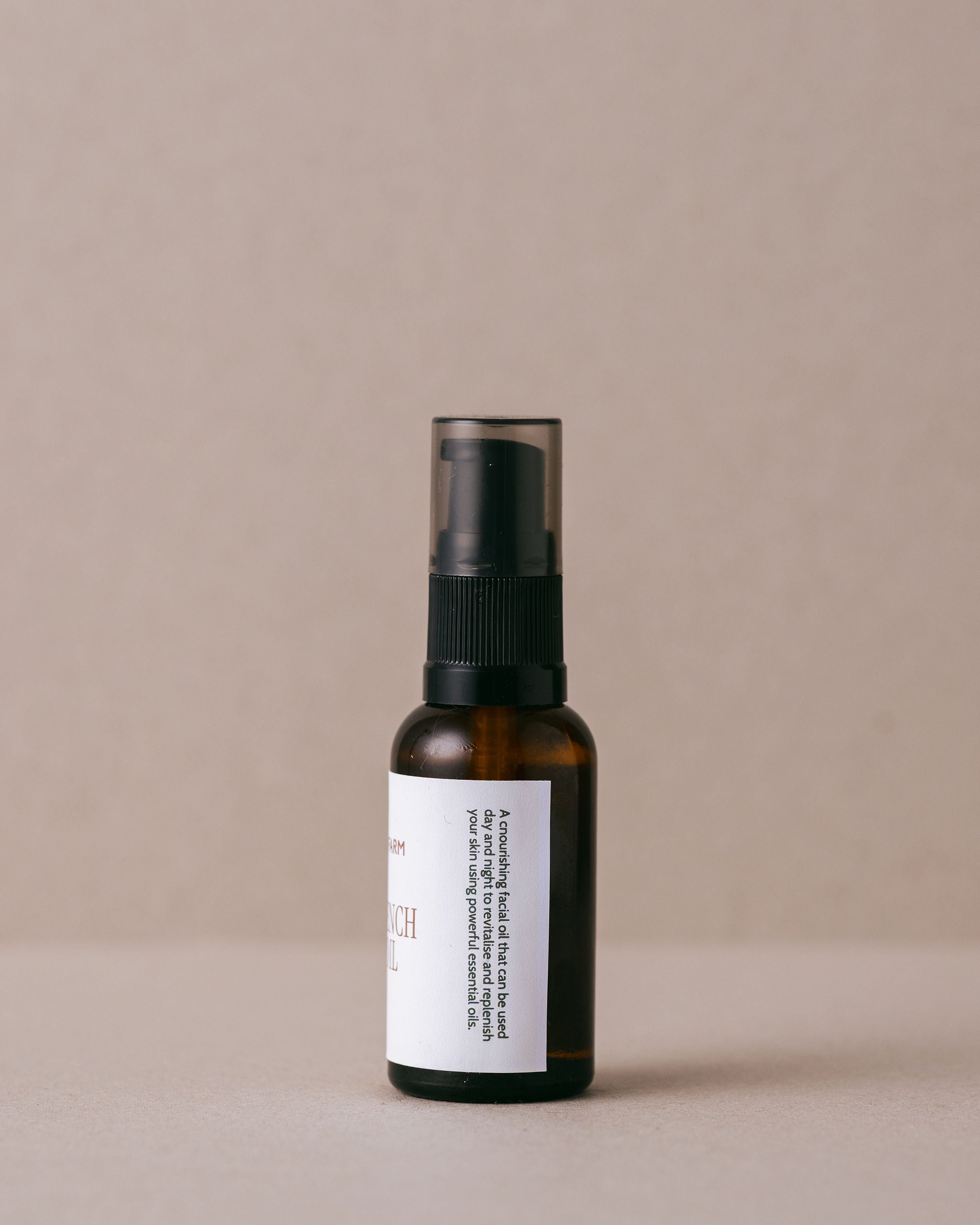 Nourishing French facial oil in a glass bottle handmade at Lavandula Farm with natural ingredients