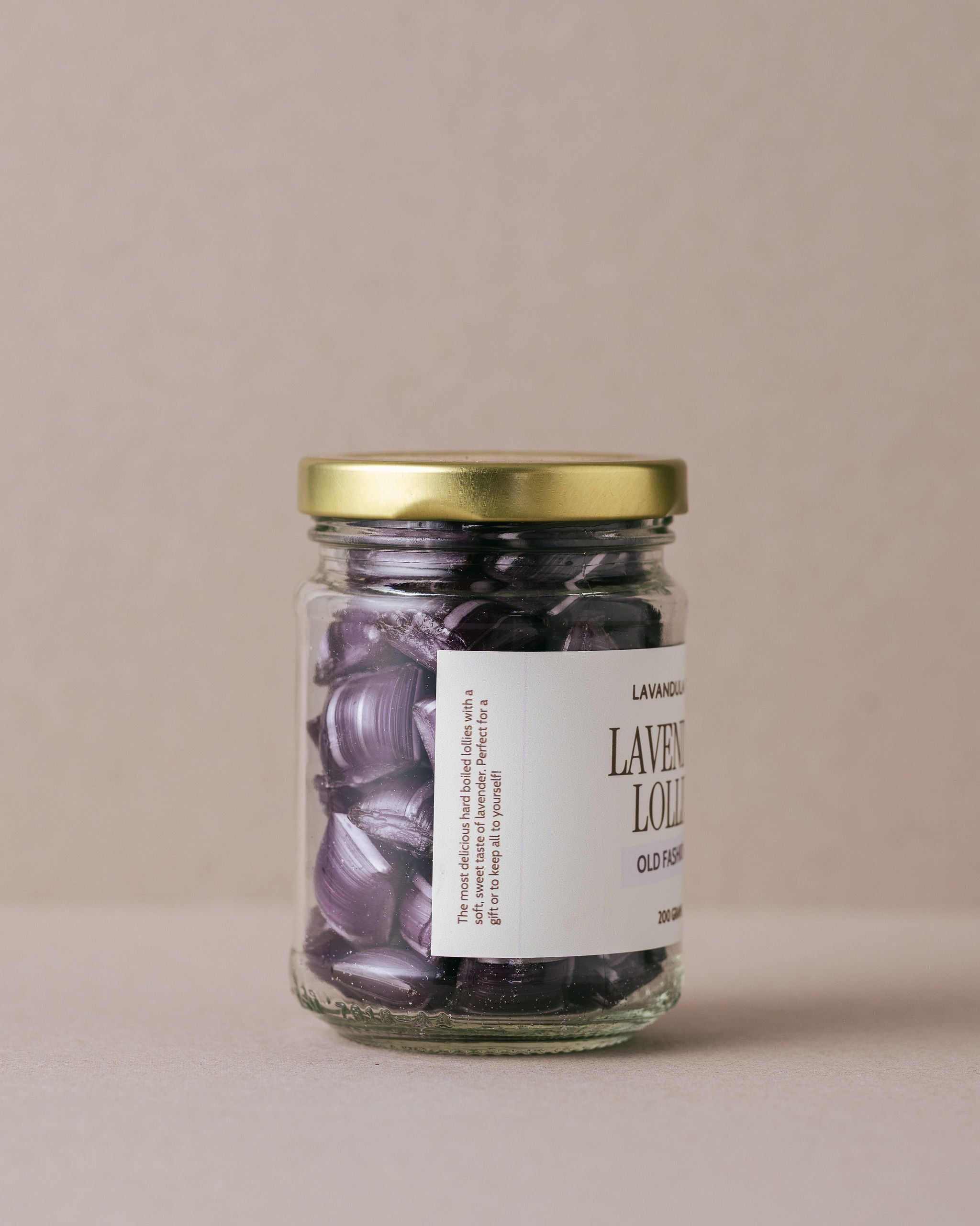 Old fashioned lavender lollies in a glass jar