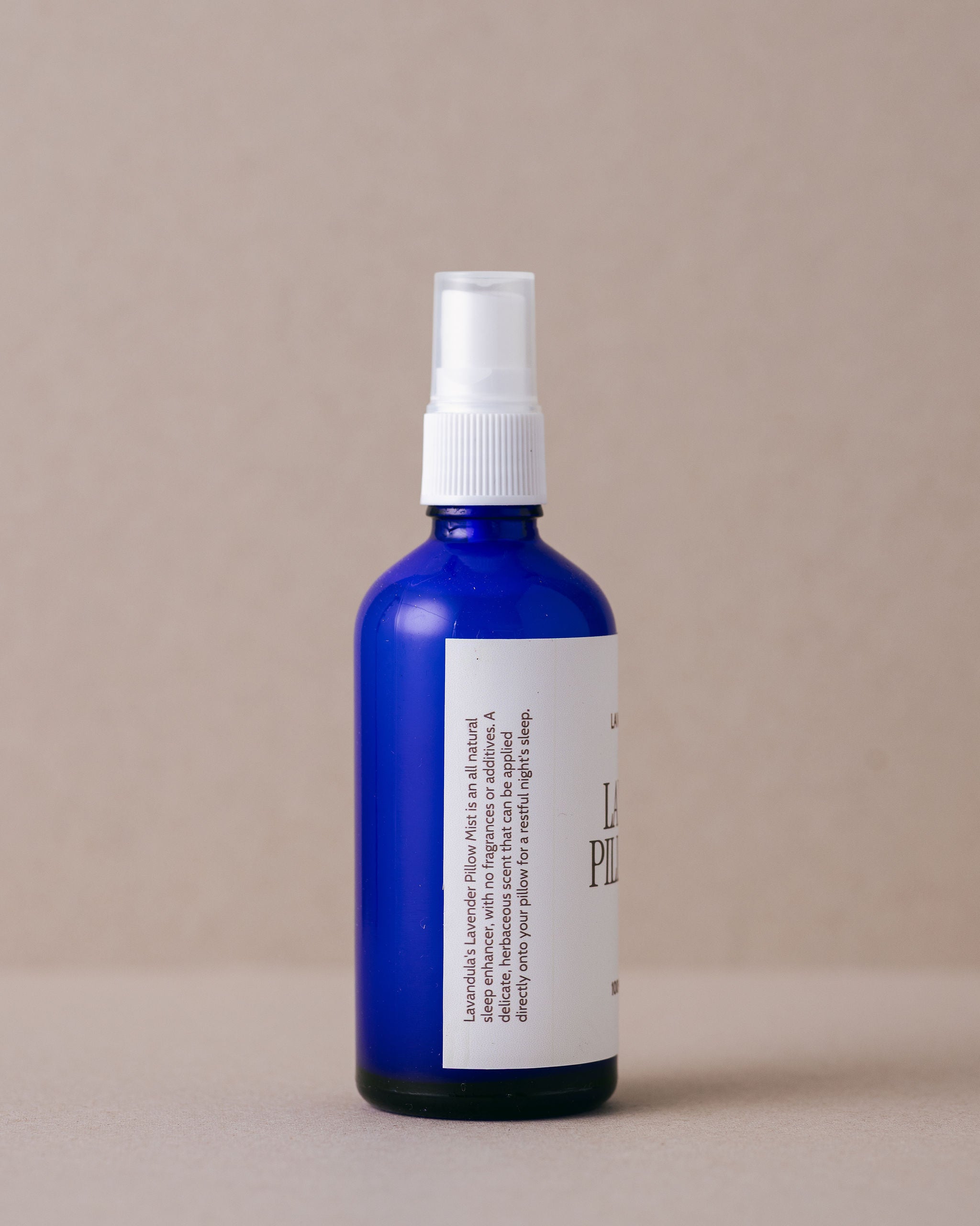 Iconic Lavandula lavender pillow mist in a blue glass bottle with  nozzle spray handmade at Lavandula Farm