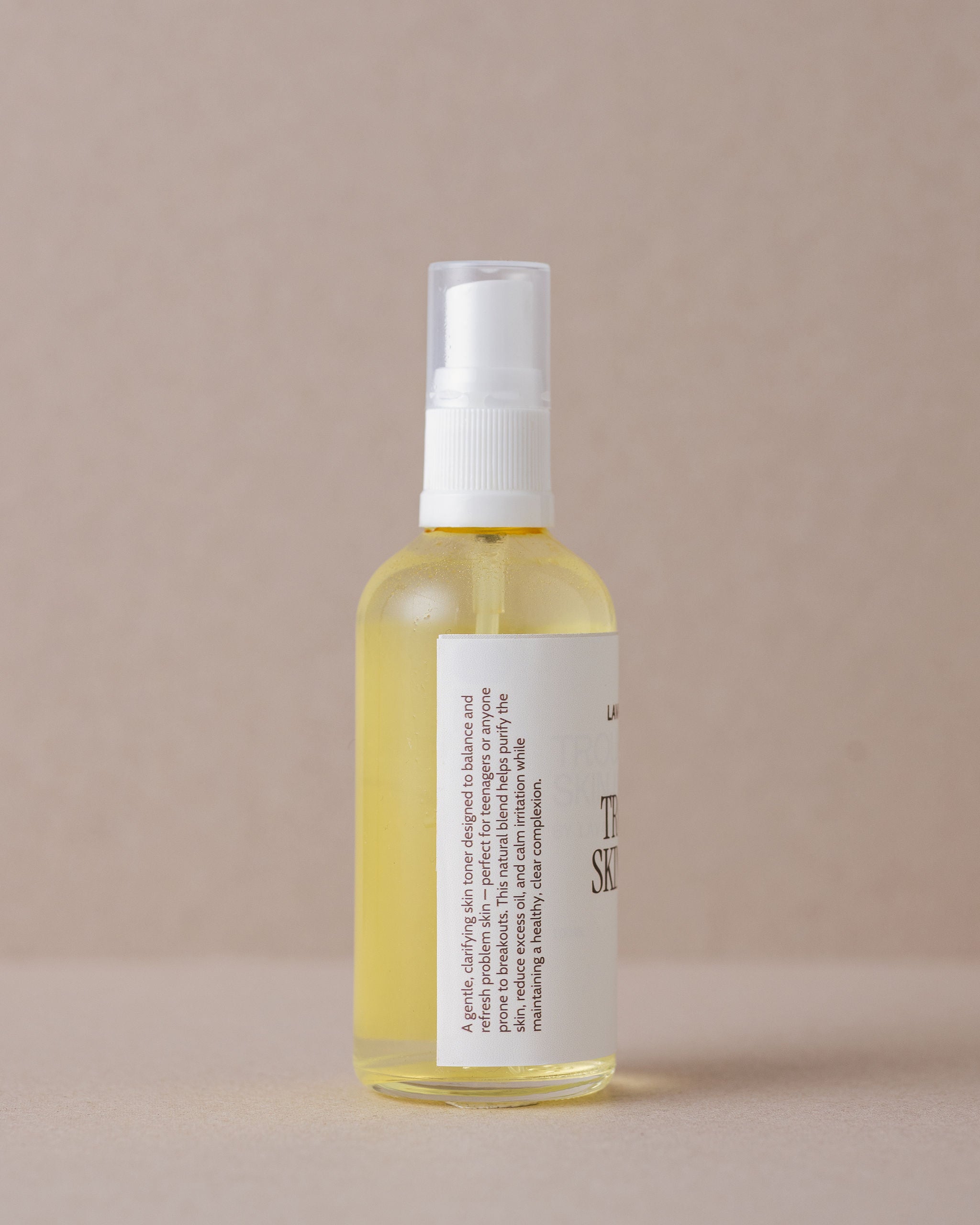 A specialised face lotion for troubled skin in a glass bottle handmade at Lavandula Farm