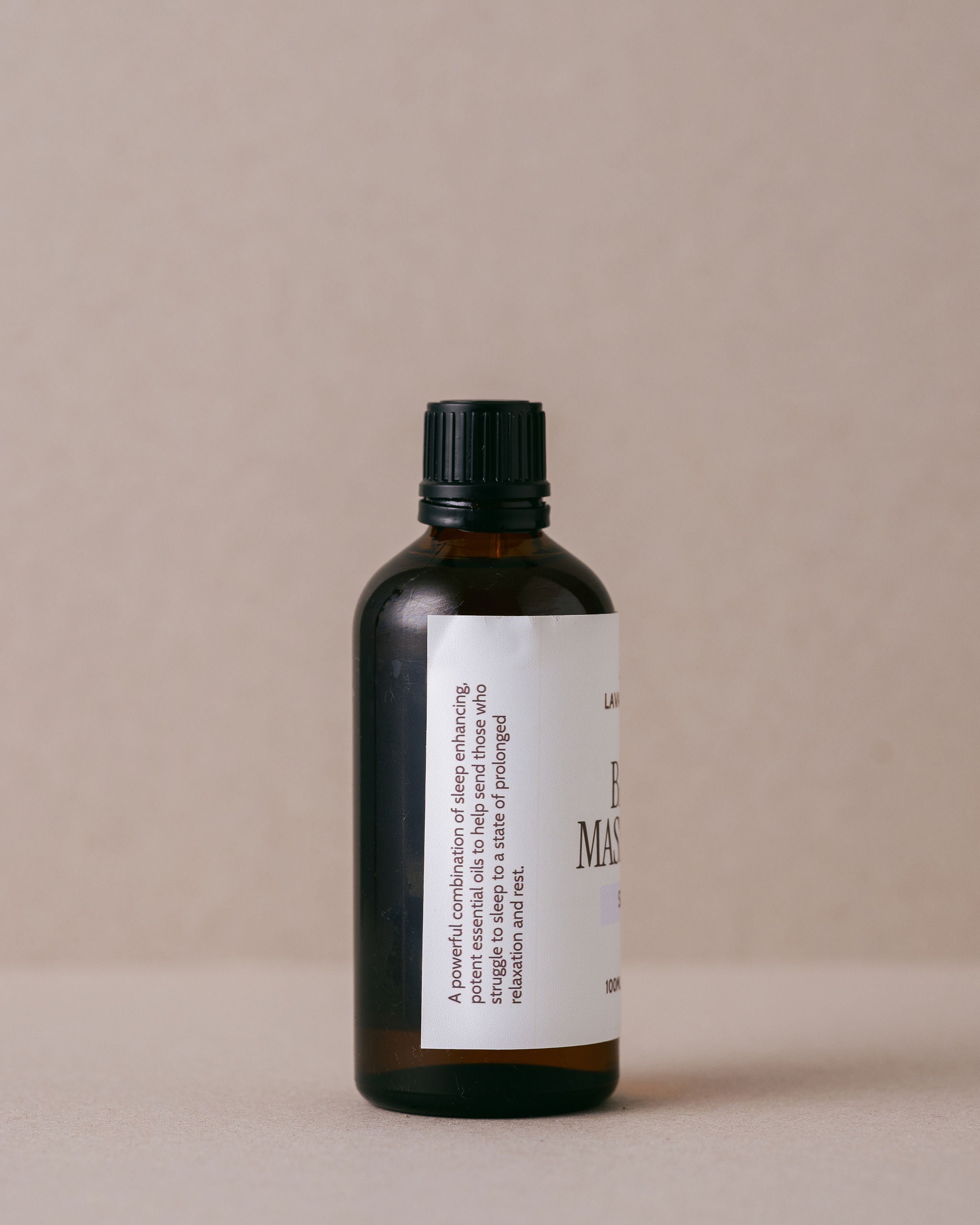 Bath and massage oil made for restful sleep in a glass bottle handmade with natural ingredients at Lavandula Farm