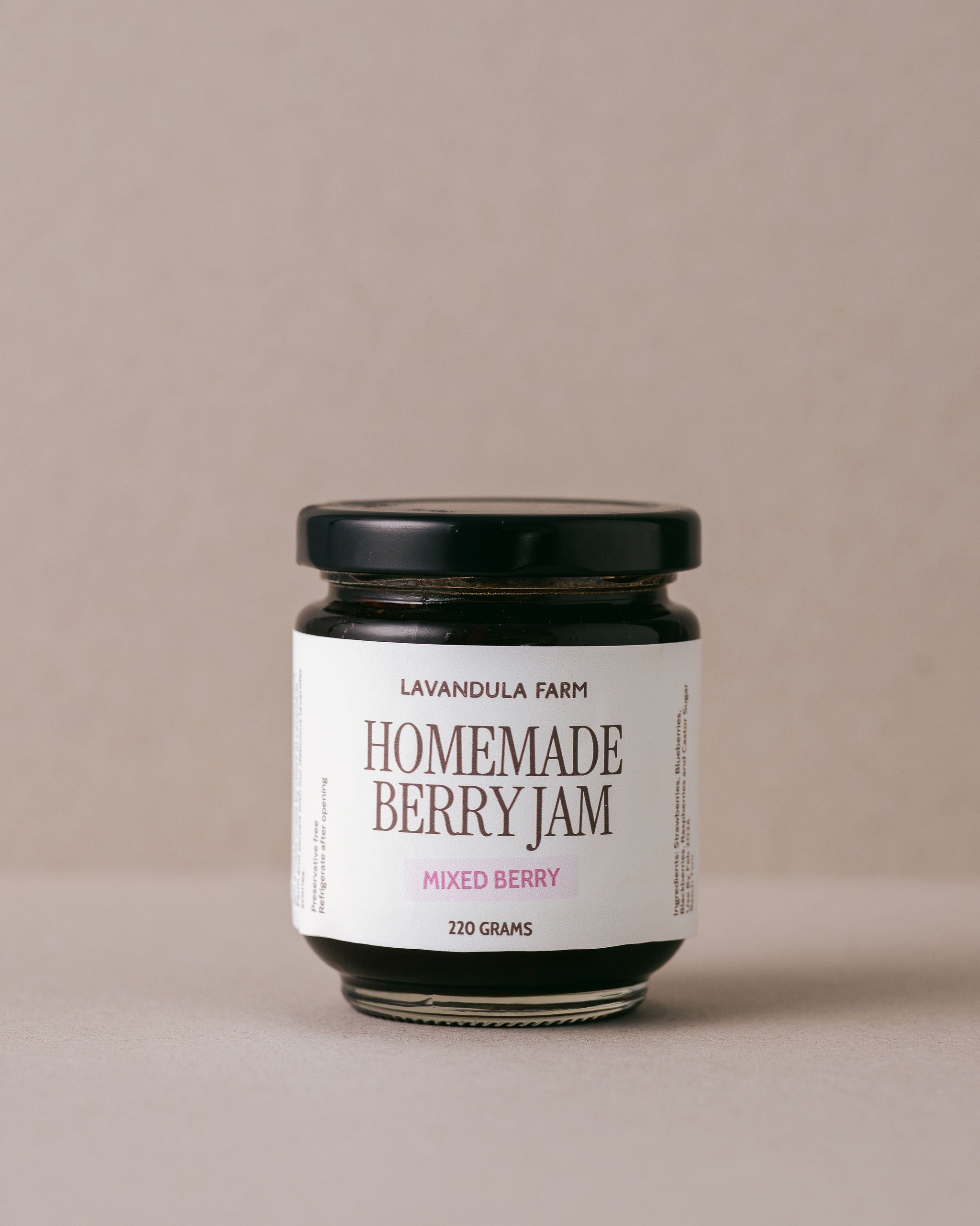 jar of Lavandula homemade berry jam on a beige background