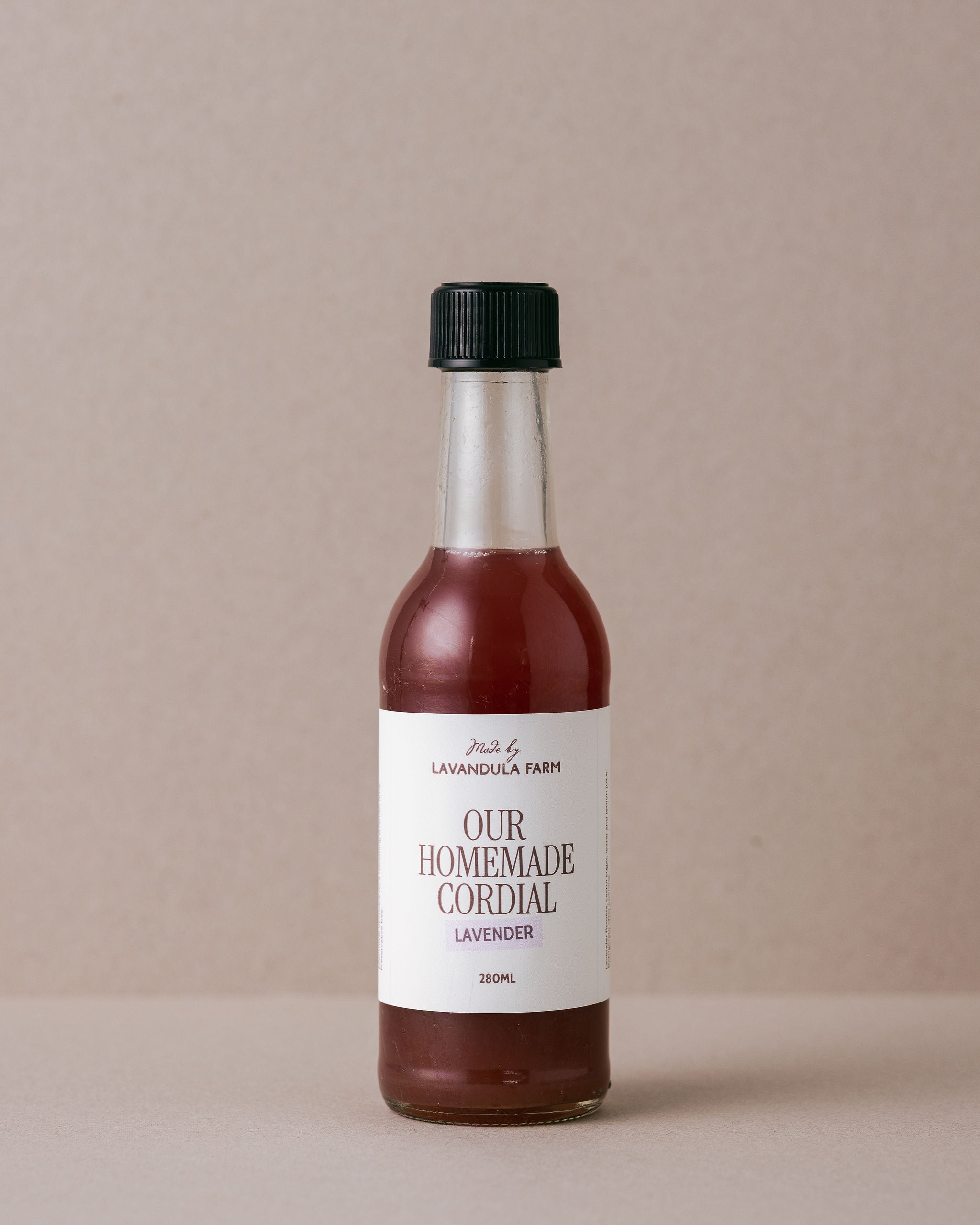 Lavender cordial in a glass bottle handmade at Lavandula Farm