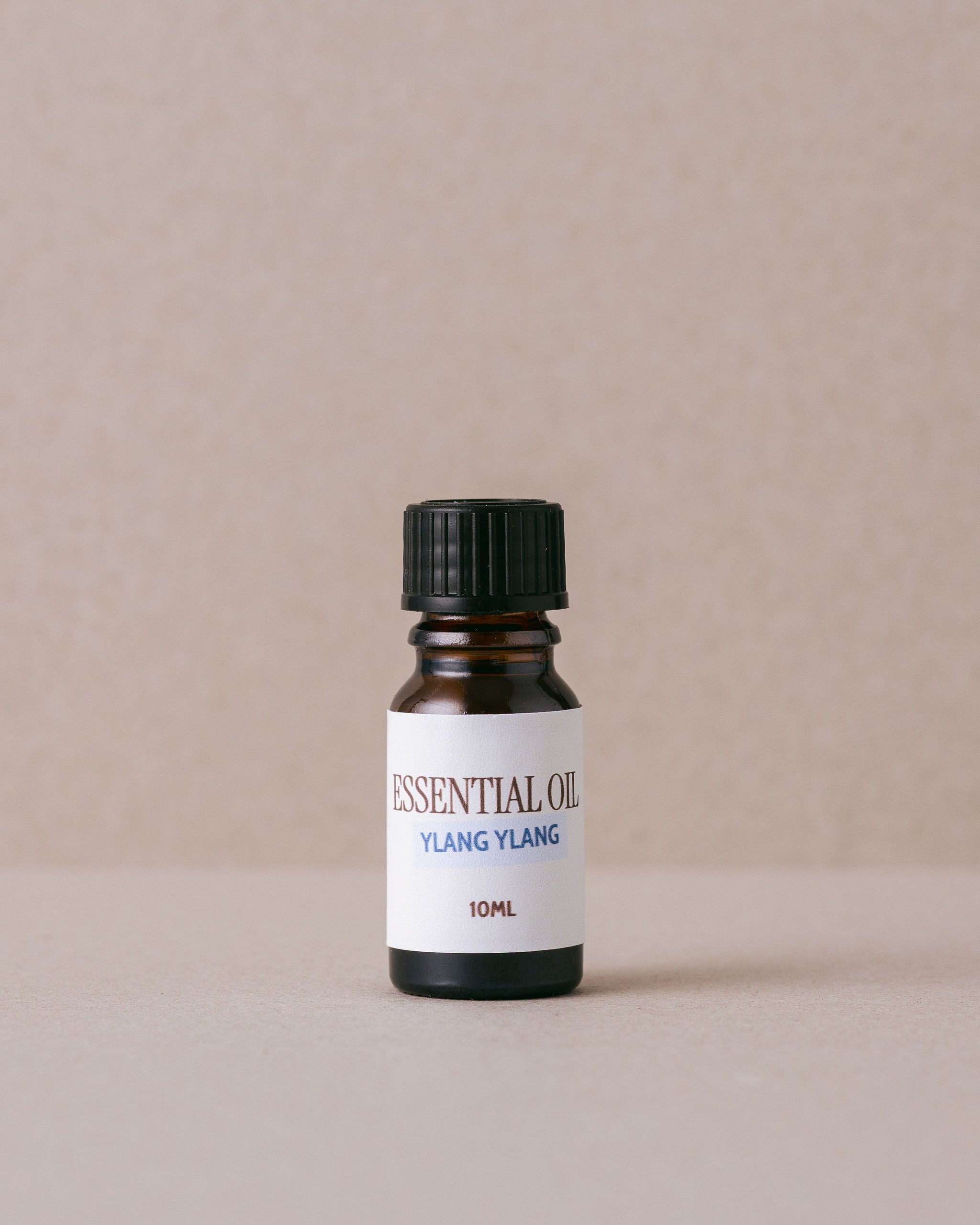 bottle of ylang ylang pure essential oil
